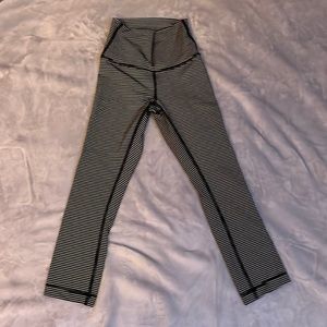 Size to length 23 inch Lululemon leggings, striped, black, and white
